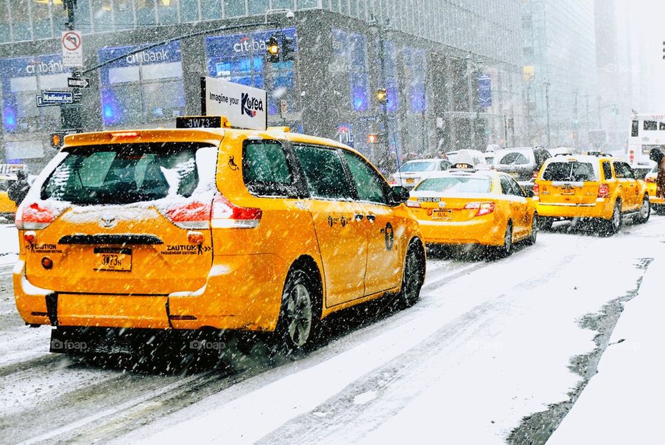 NYC taxi cabs in the snow