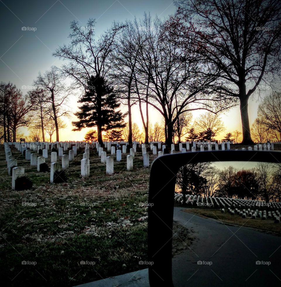 military graveyard at sunset