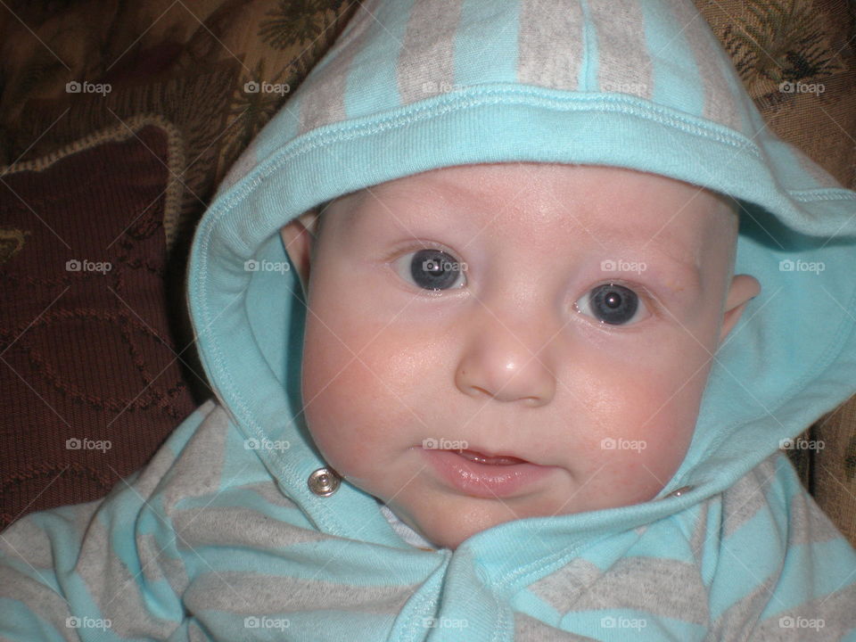 Blue eyed beautiful baby boy