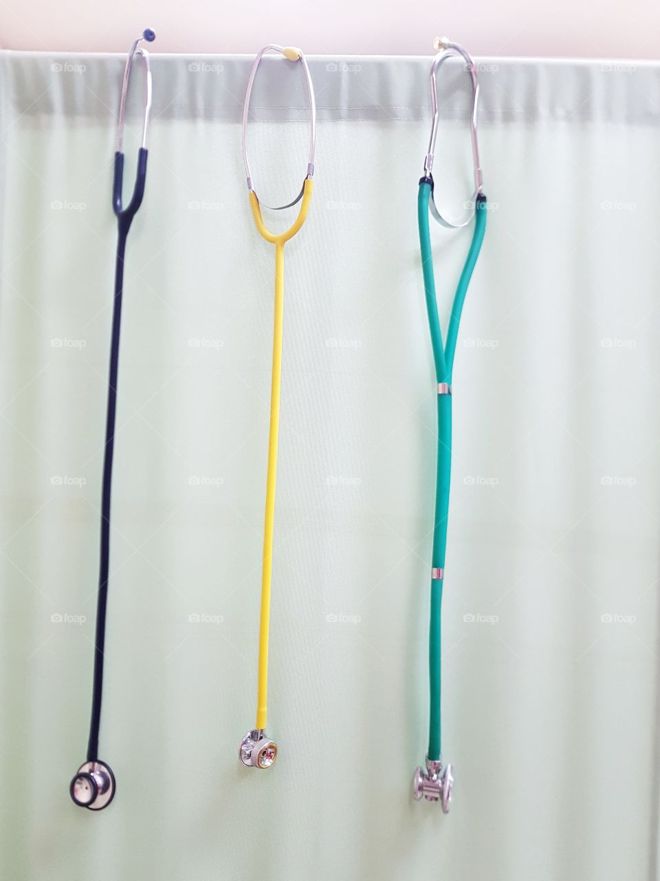 Three colorful stethoscopes