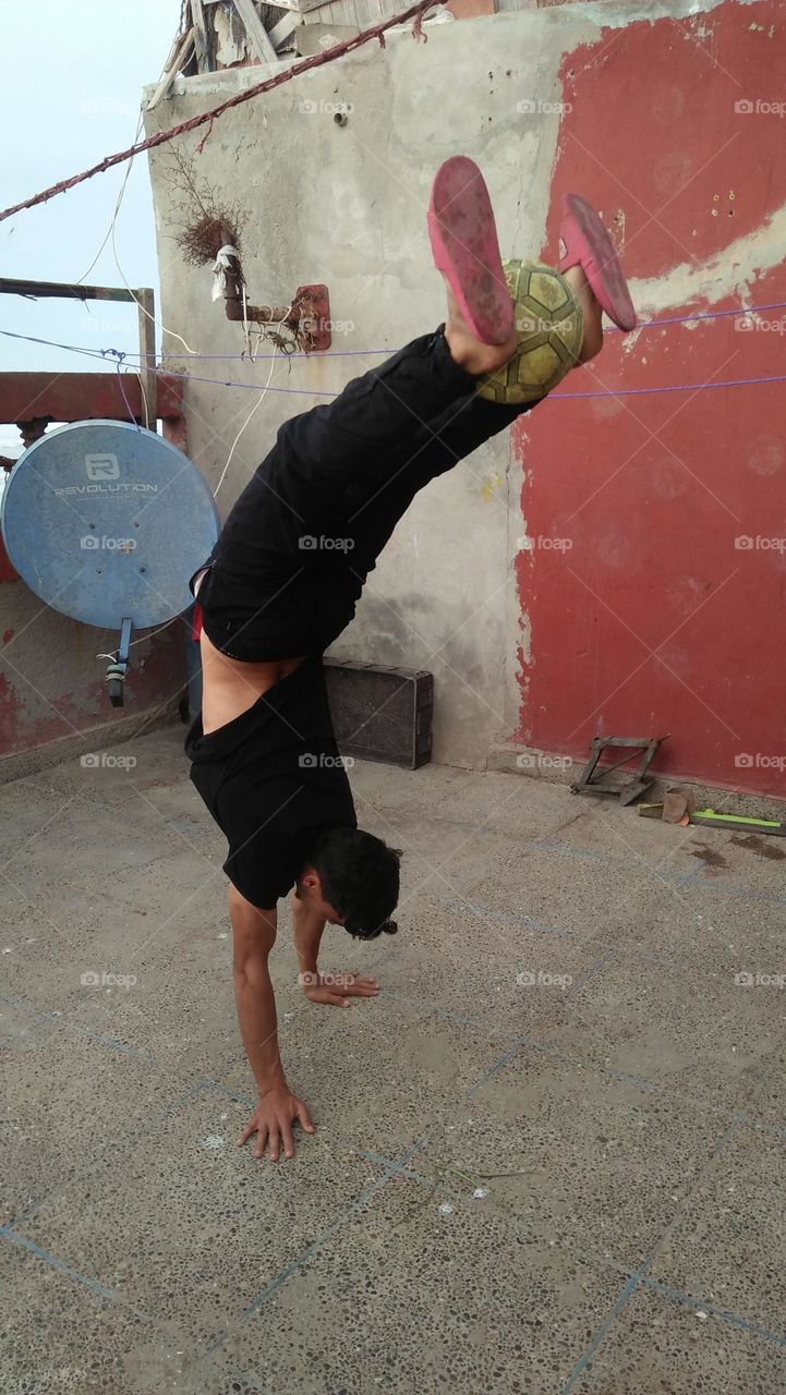 adult man doing best acrobacy.