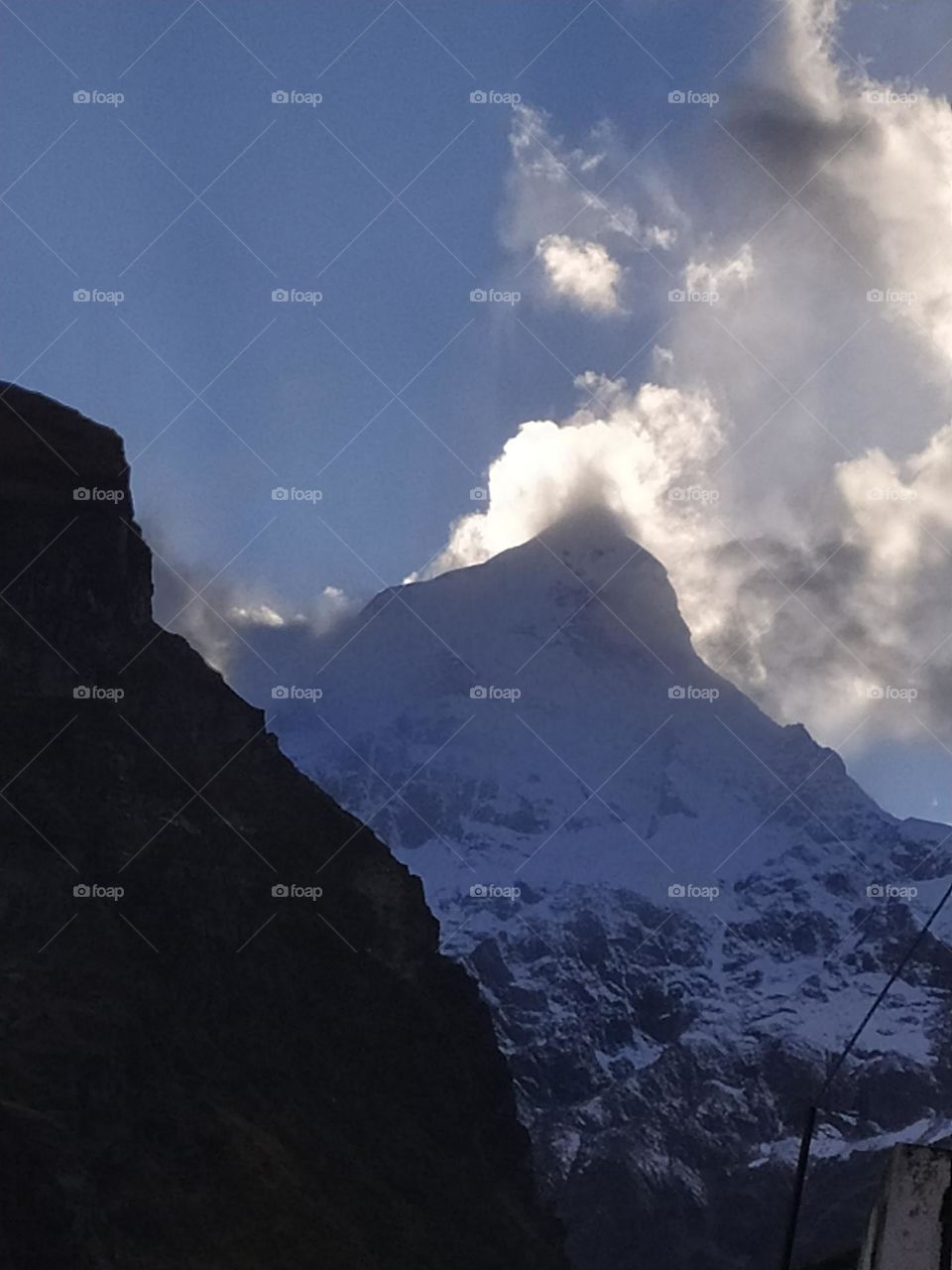 On a vacation in the Himalayas. Evening view of the magestic Neelkanth peak
