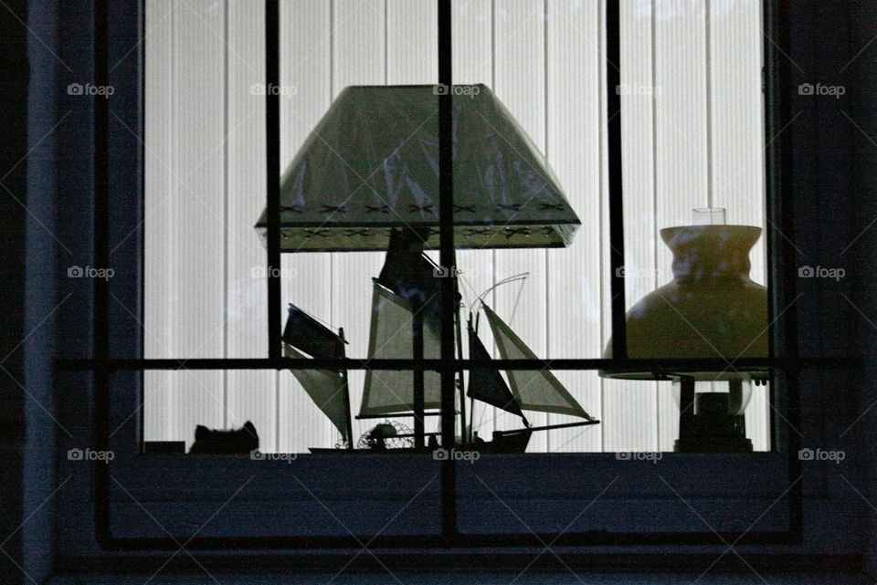 A Model of a ship in the window 