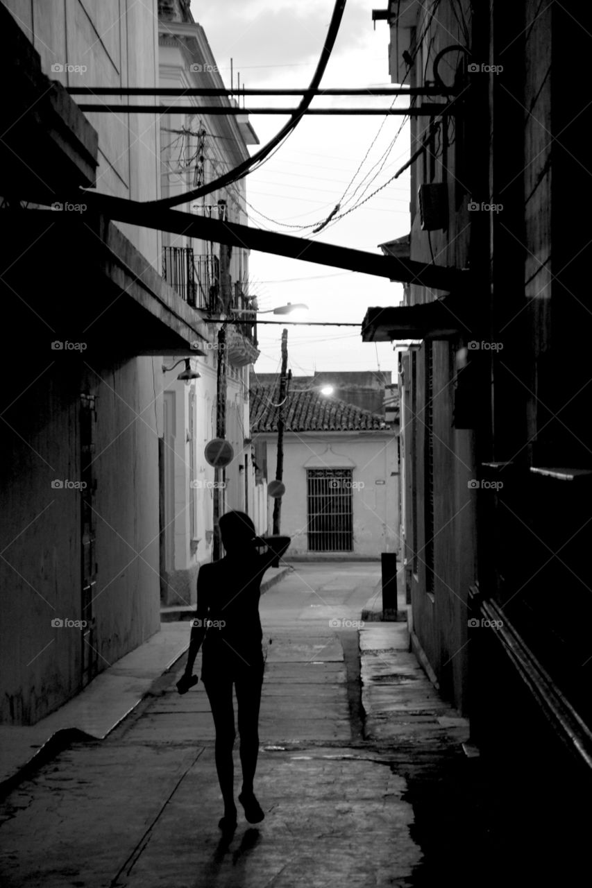 Girl on alleys shadows