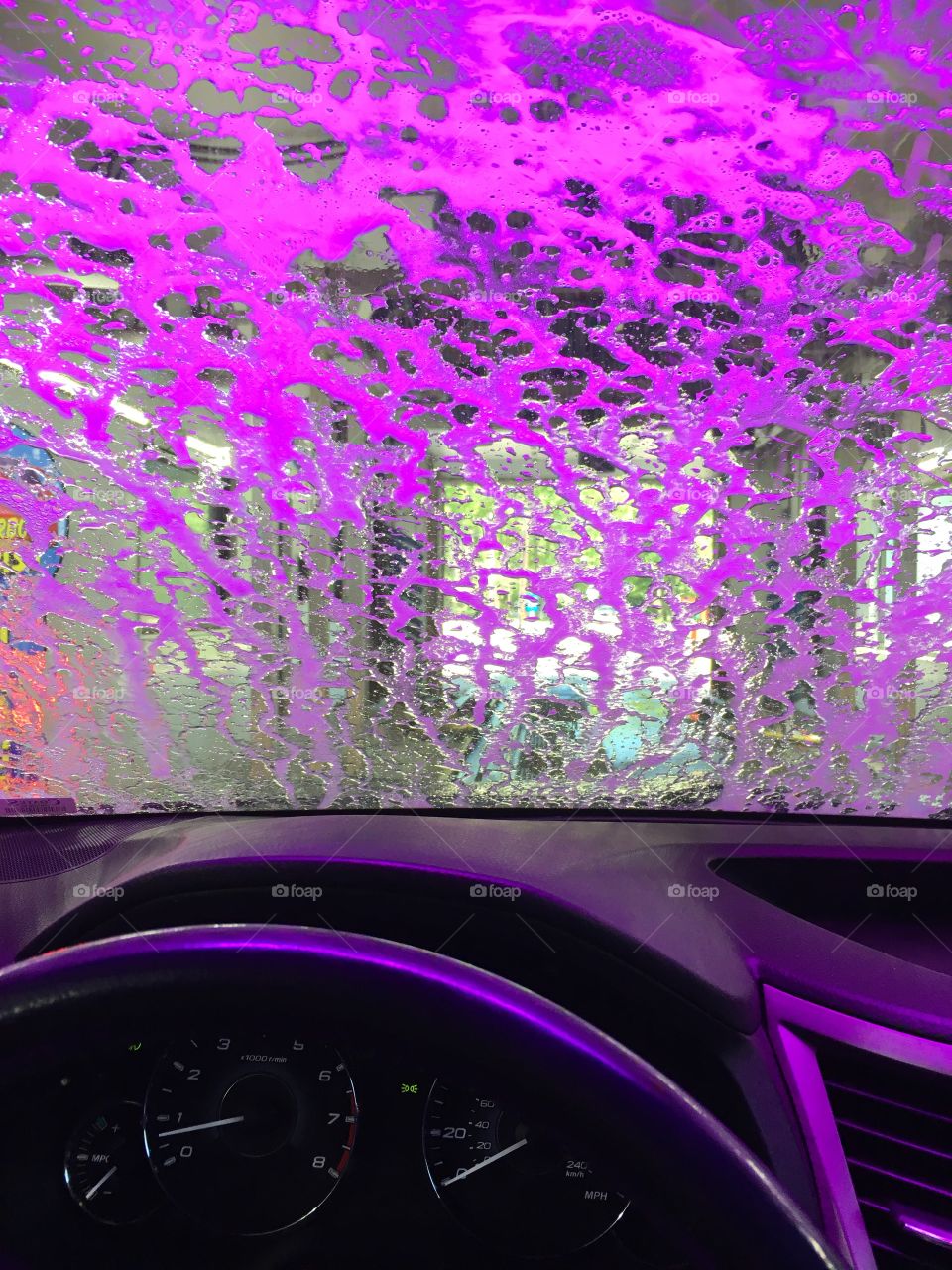 Getting a car wash!  Cool purple foam!
