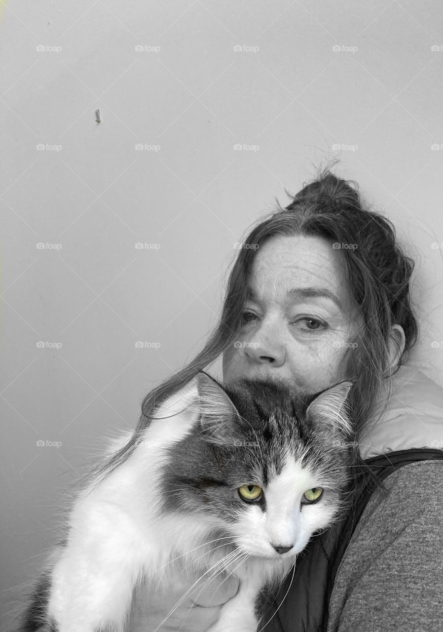 iPhone portrait - black and white woman with cat.