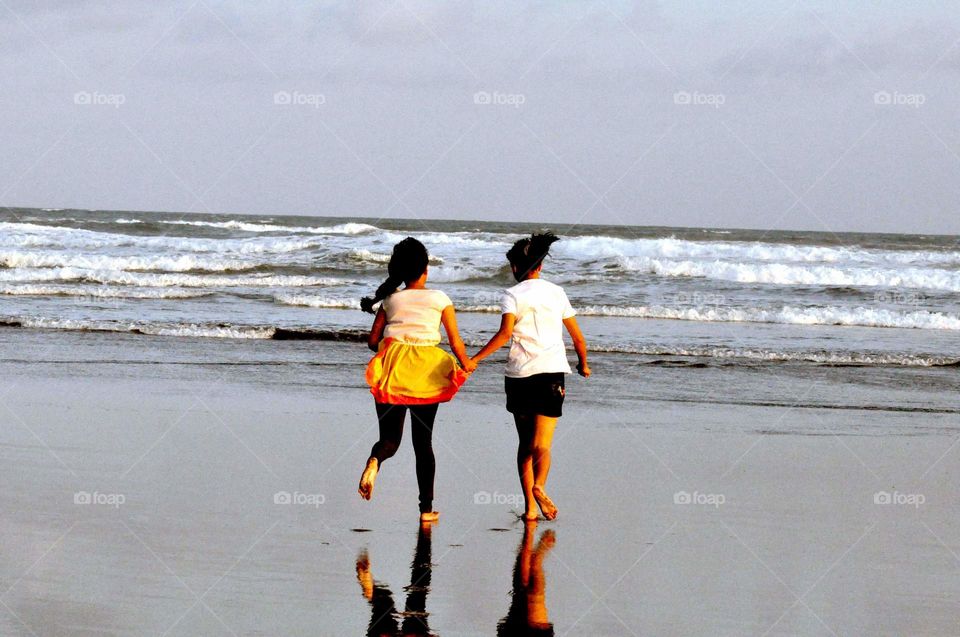 --Run into the waves....