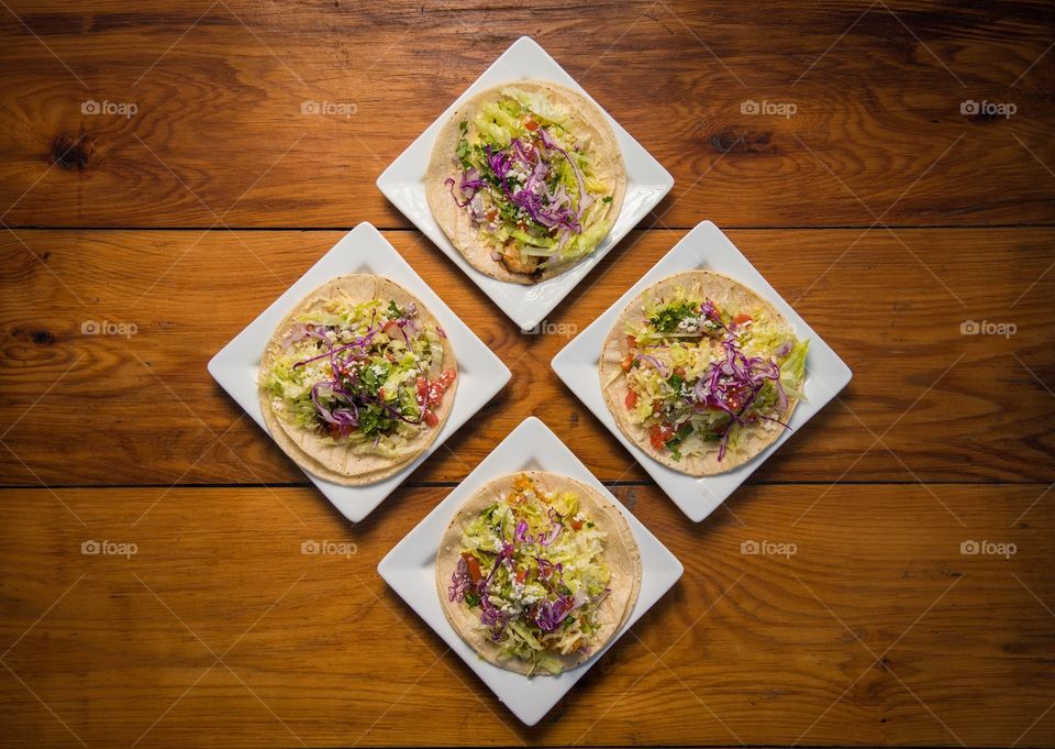 Street tacos on plates