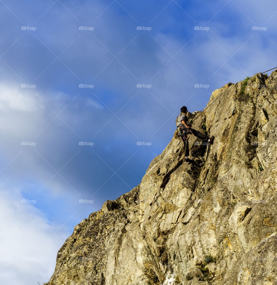 Getting to the top and bottom of a mountain side with ropes and lots of work 