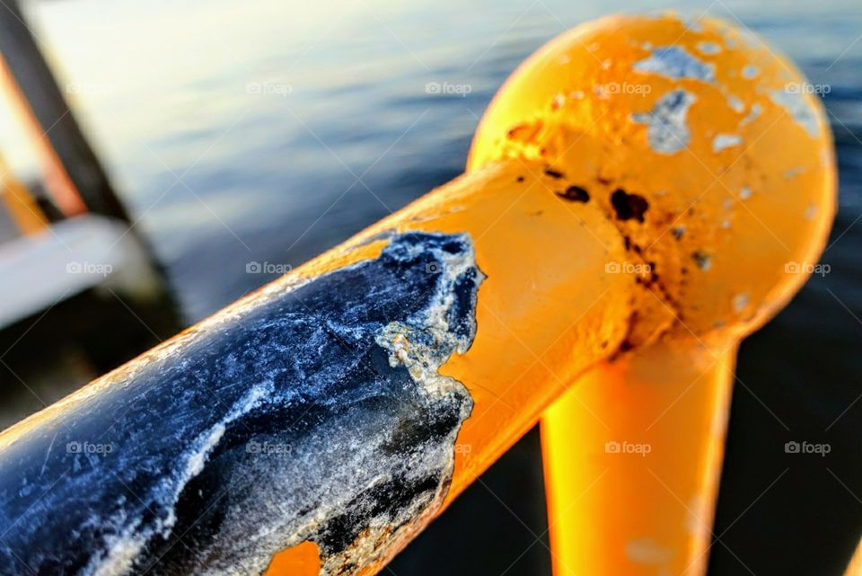 Metal hand railing on jetty