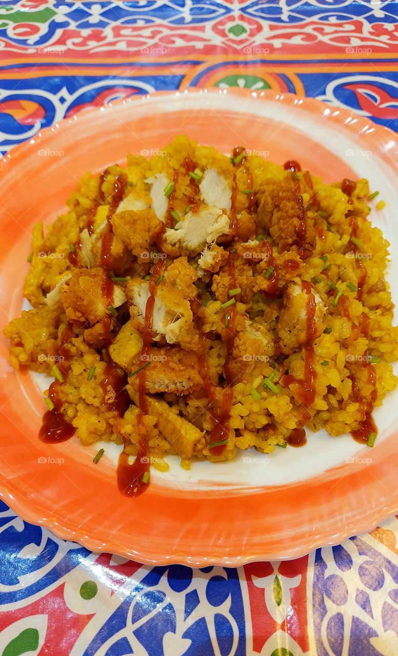 Rizo rice with chicken strips