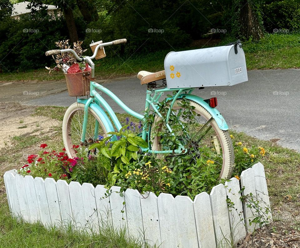 One Lonely Bicycle - There’s just something about a bike decorated with flowers that makes it look right at home. A certain nostalgia we associate with simpler times. 