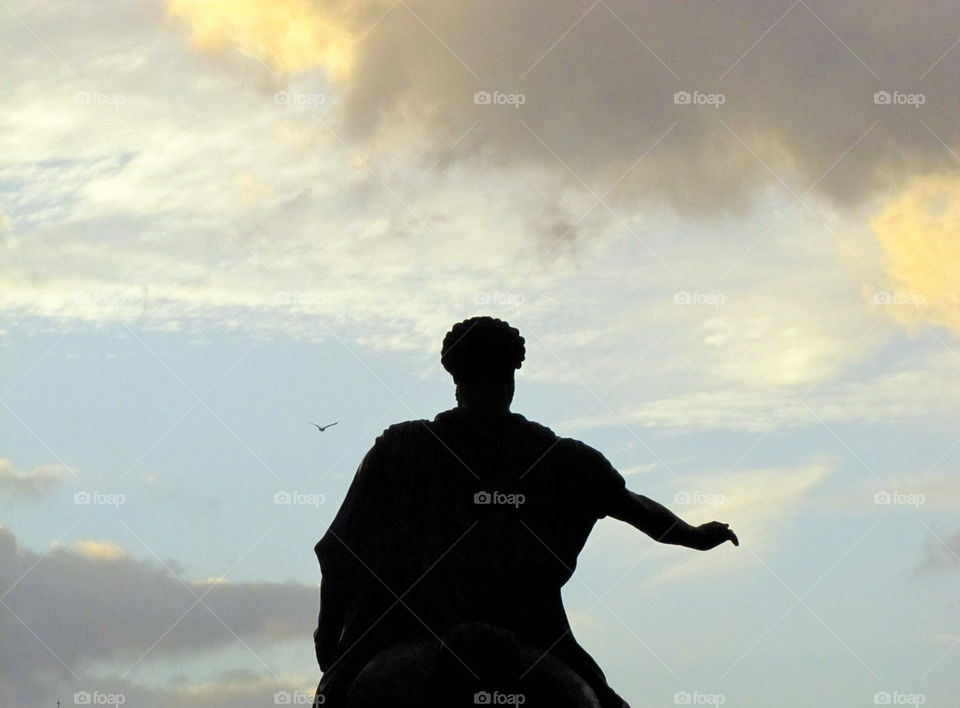 knight statue above the city in To the clouds