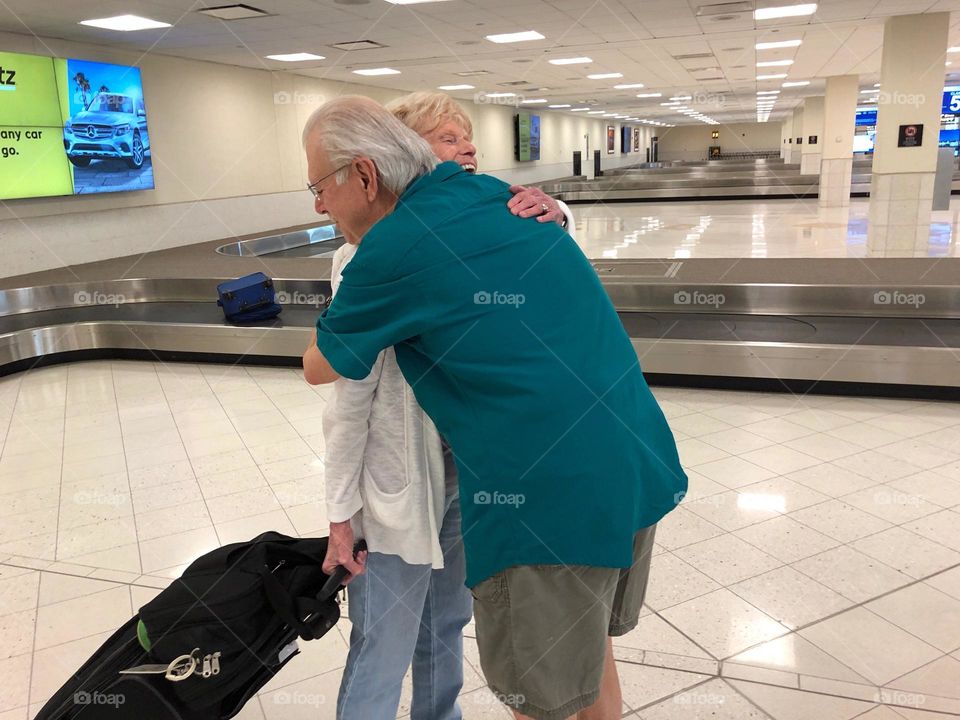 Joyful family reunion at the airport.