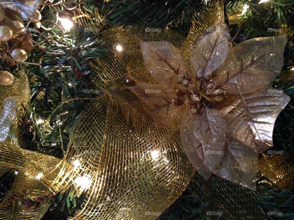 Christmas tree with gold decorations 