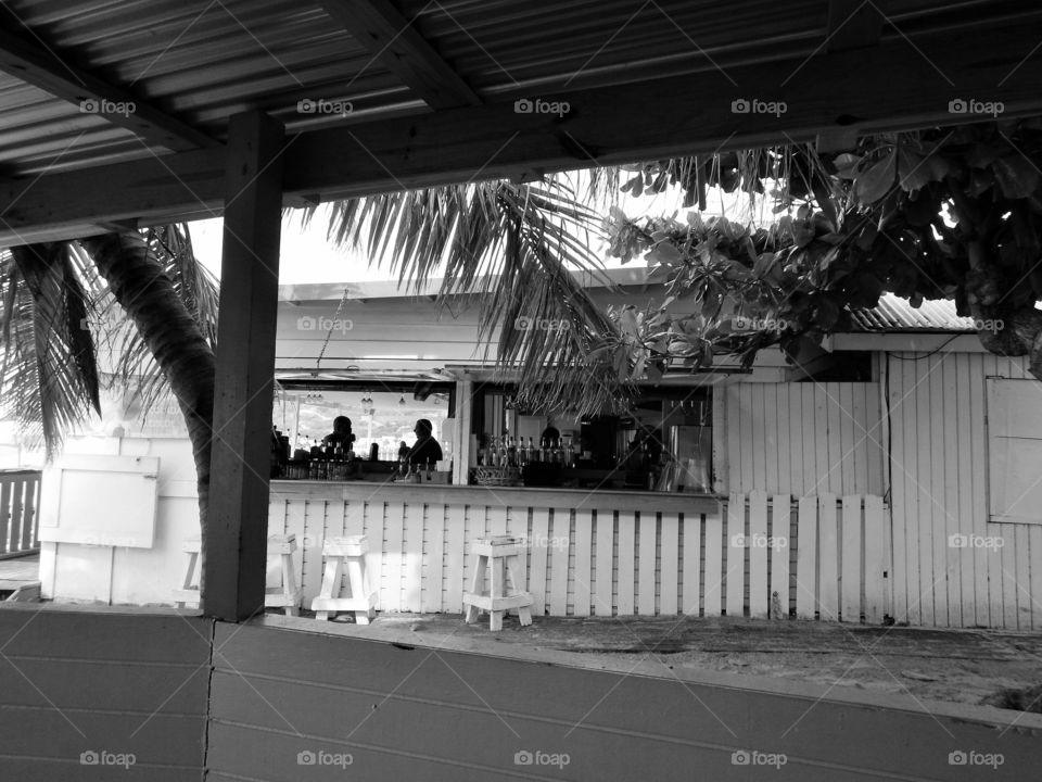 Bar in St Maarten. Black and white photo of bar Windows