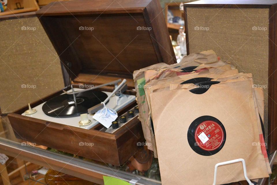 antique record player and vintage record collection
