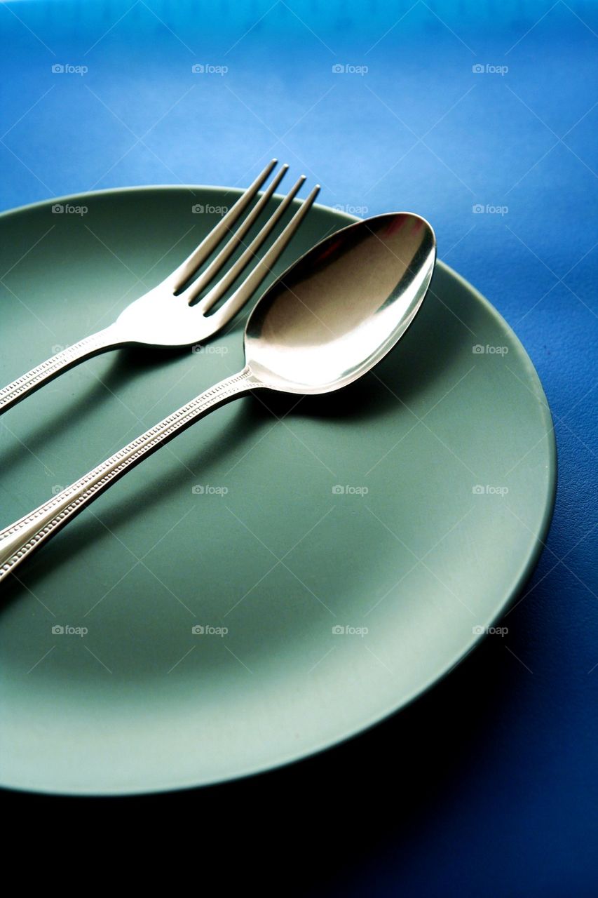 spoon, fork and plate