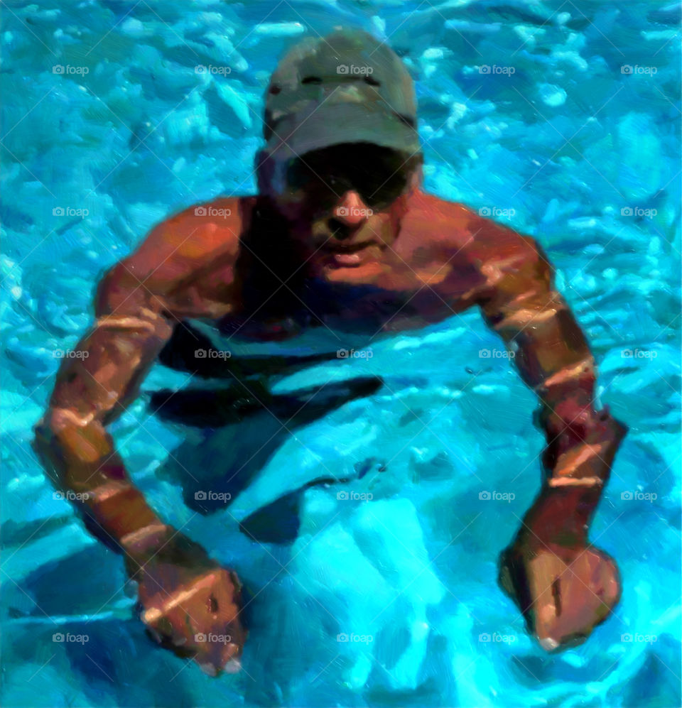 Man swimming in pool