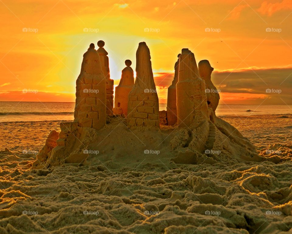 
A sandcastle on the sandy beach - Light: Natural vs artificial vol 2. Light is the backbone of photography. Without light, there are no photos. After all, the word photo means light.