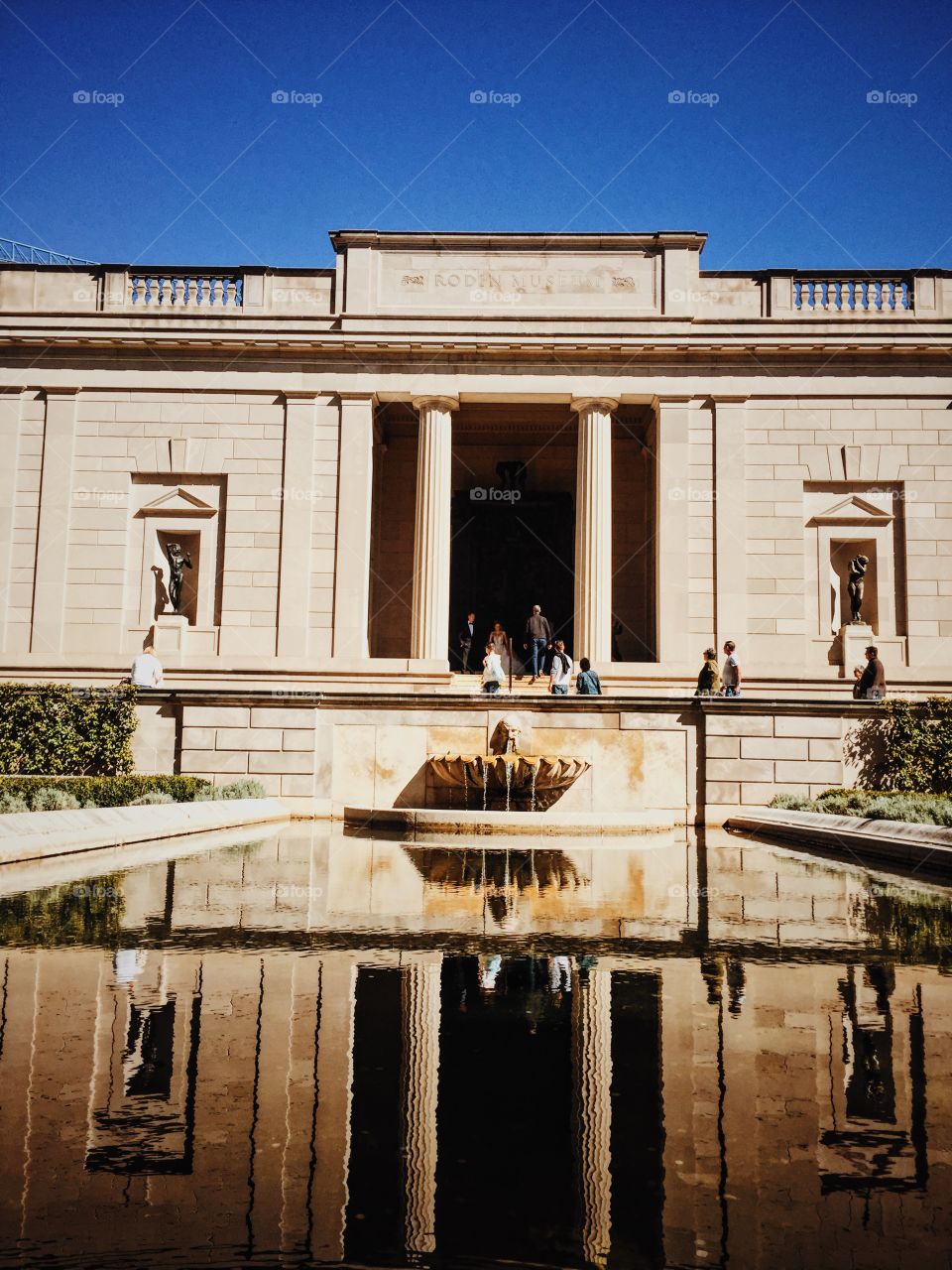 Wedding Bliss. Wedding photos being taken at the Rodin Museum, Philadelphia 