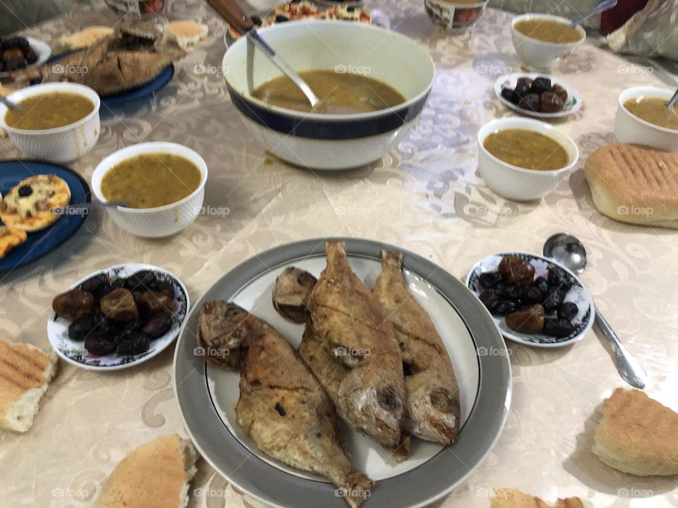 Moroccan table full of food in ramadan fasting month.