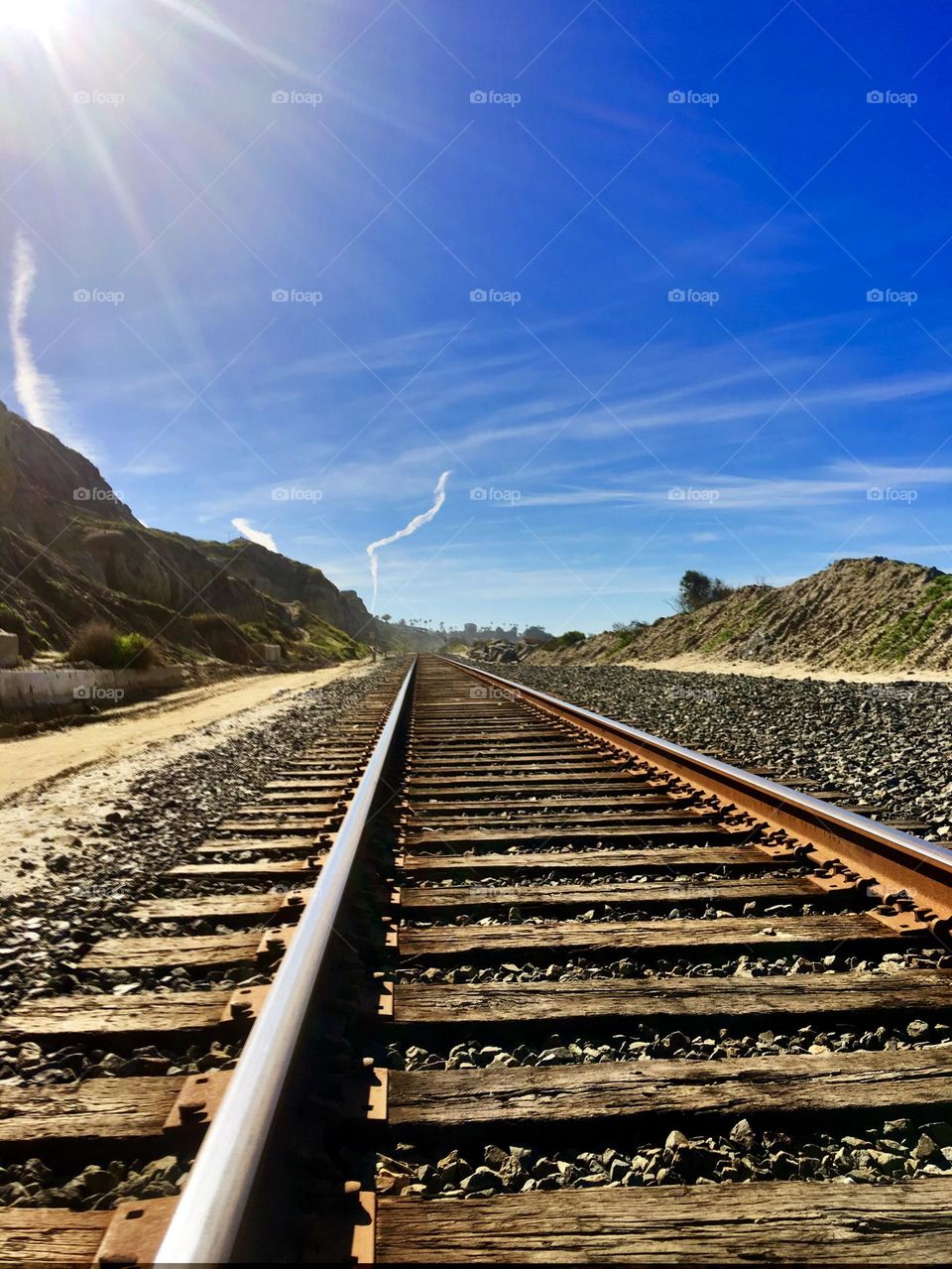 Foap Mission “Photo Of The Week”!  Coastal Landscapes! Train Tracks With Early Morning Sunshine And Clouds Along California Coastline!