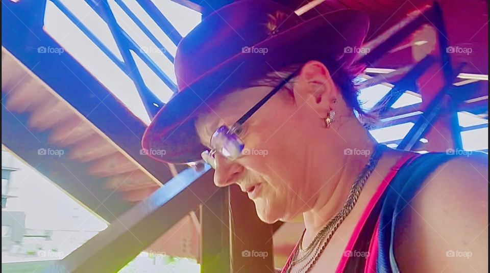 I, „Petra Schiller“ a.k.a. „Maxine Firefox“ am descending the red metal staircase of the „Pulaski Bridge“ onto the „Greenpoint“, Brooklyn side to go shopping for groceries. 2023. Hypnotic Productions