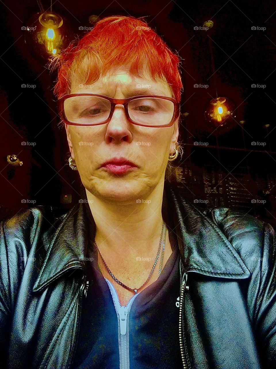 „Petra Schiller“ in an outdoor café somewhere in the vicinity of Brooklyn, NY in 2019 wearing her cool leather jacket. Hypnotic Productions