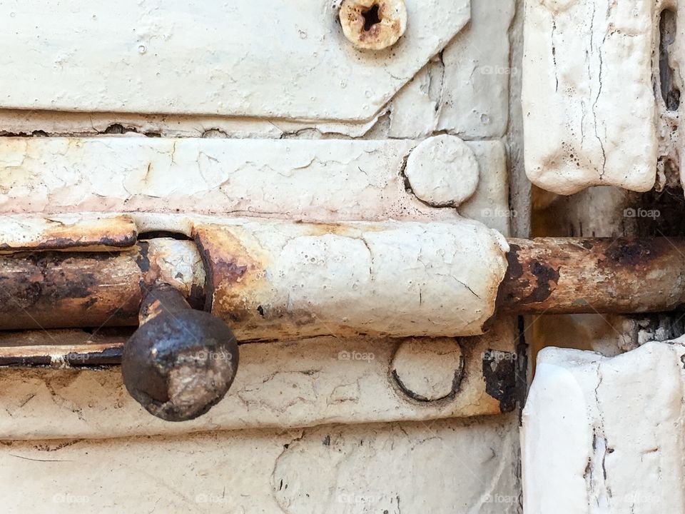 Rusted old antique door latch sliding