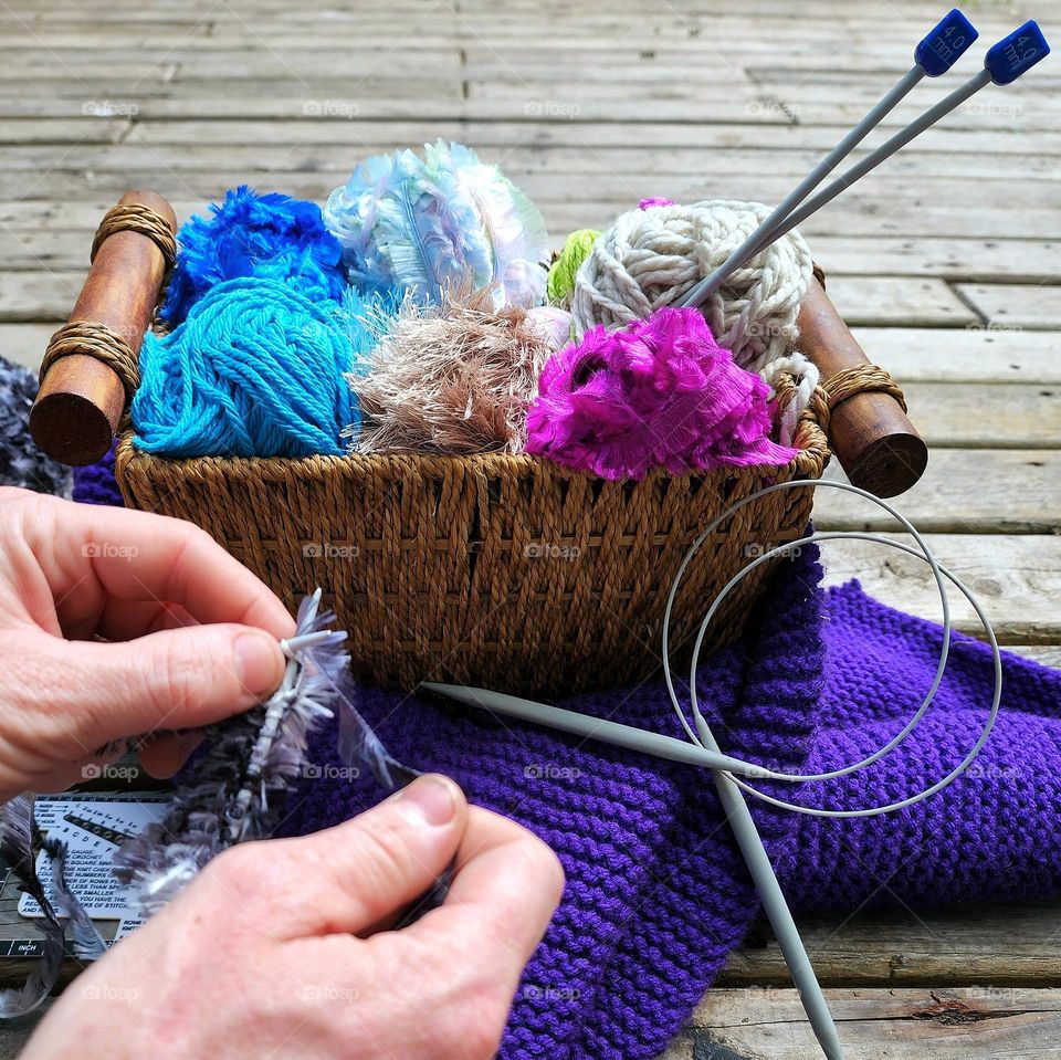 Knitting a warm cozy scarf