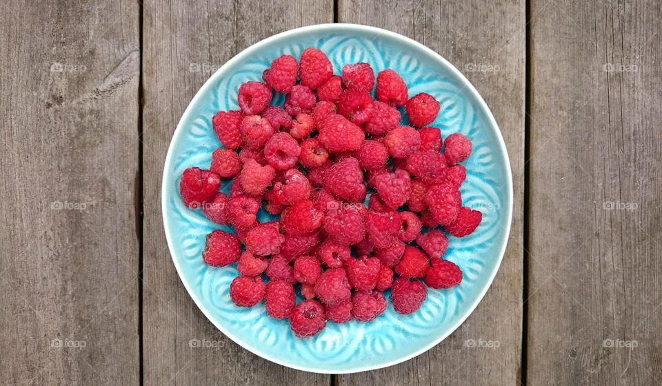 Raspberries in plate