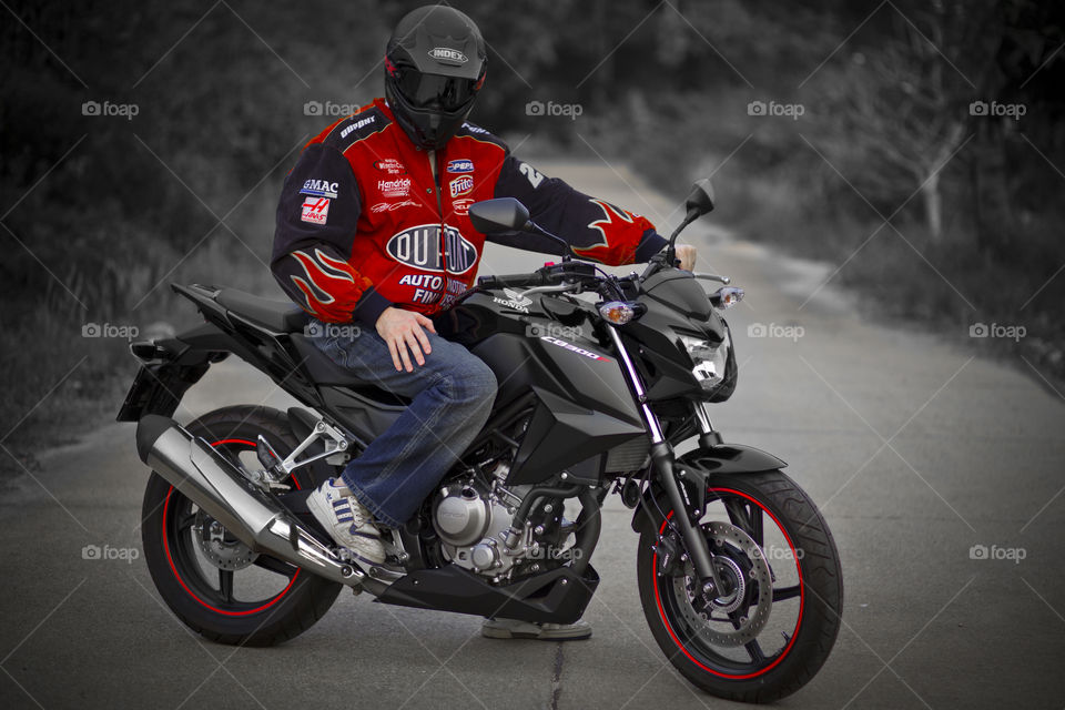 Biker on a Honda CB 300. ready to race with me?