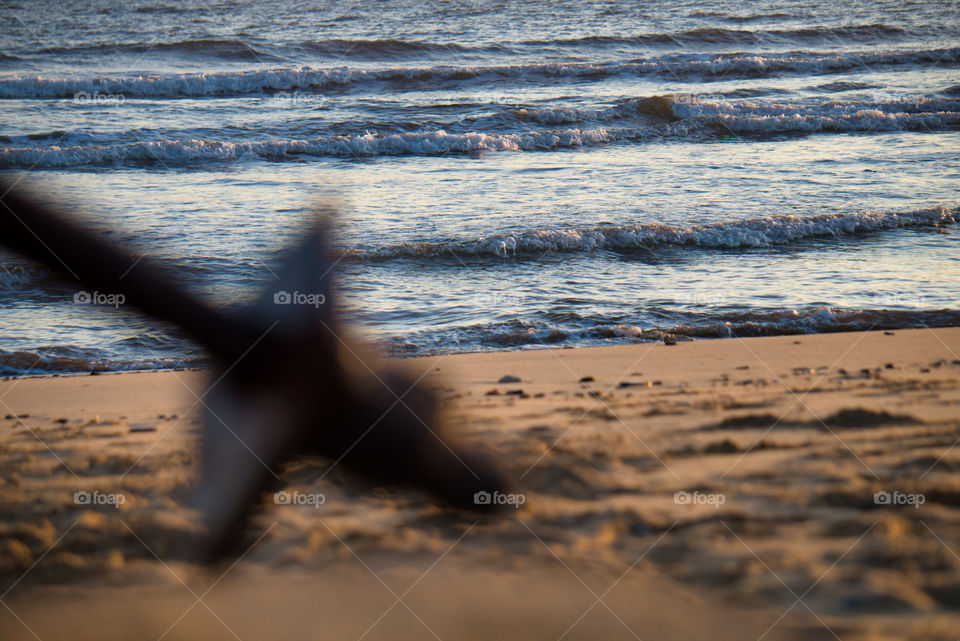 rusted nut and bolt on beach
