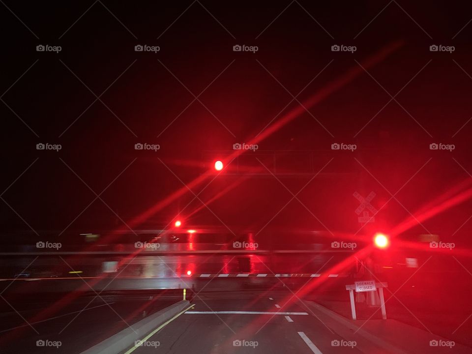 3 bright lights on the railroad track 