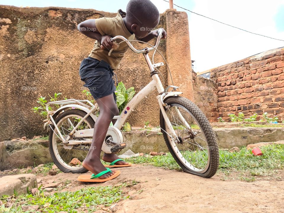 My son and his old bicycle
