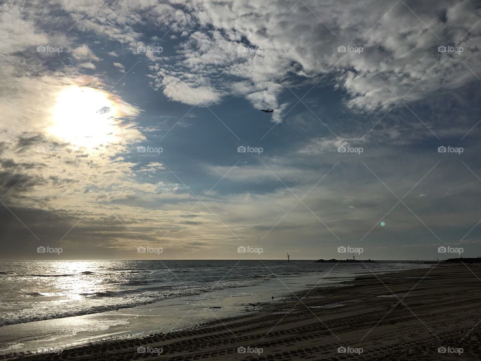 Golden hour sunset on the beach in south Australia glassy and calm sea 