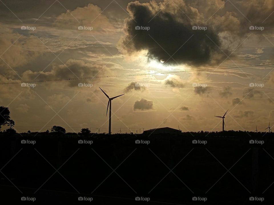windmill device for tapping the energy of the wind