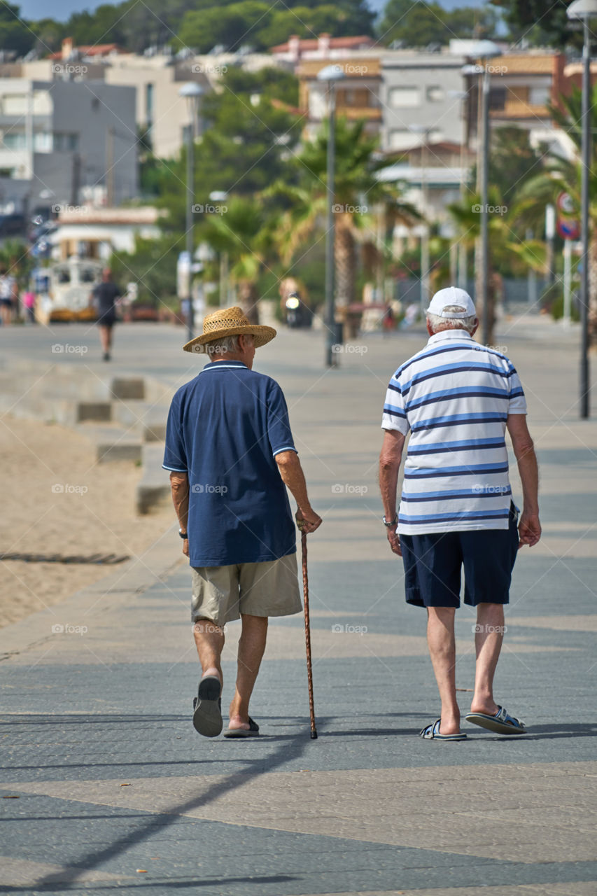 Elderly men walking