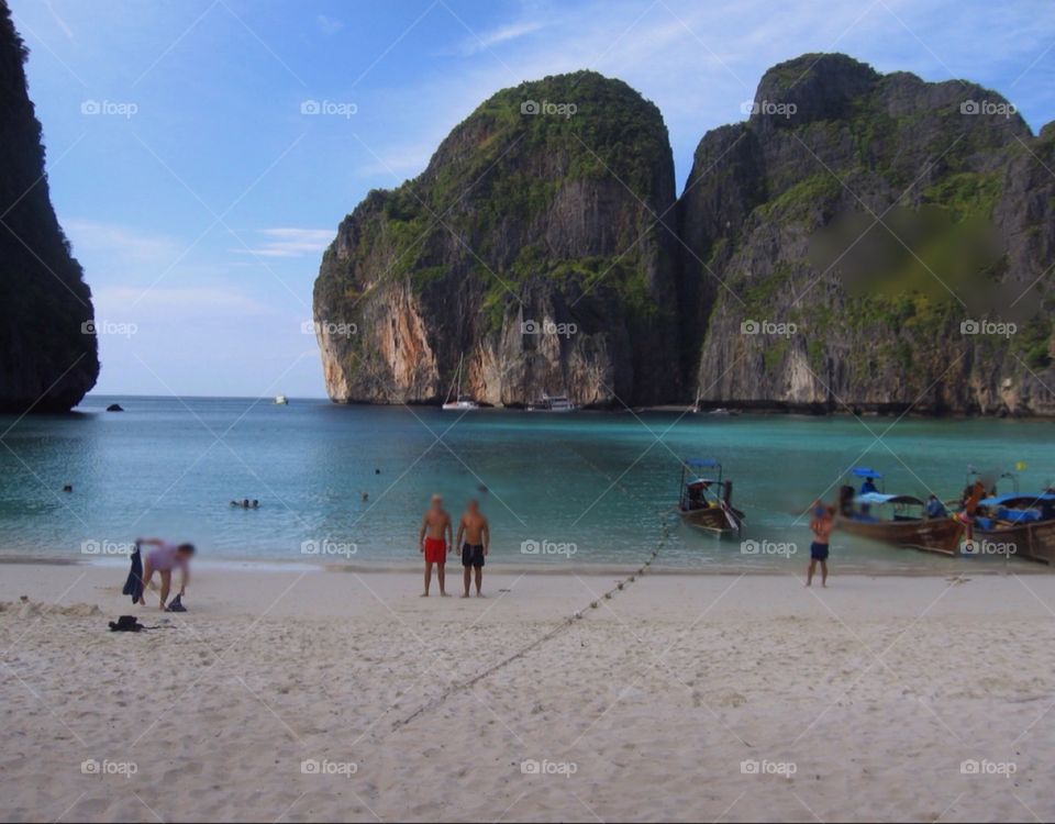 Tourists on a beach in Thailand