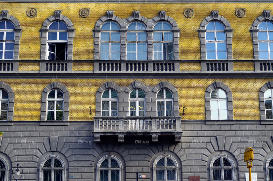 Yellow coloured building exterior in Budapest, Hungary.