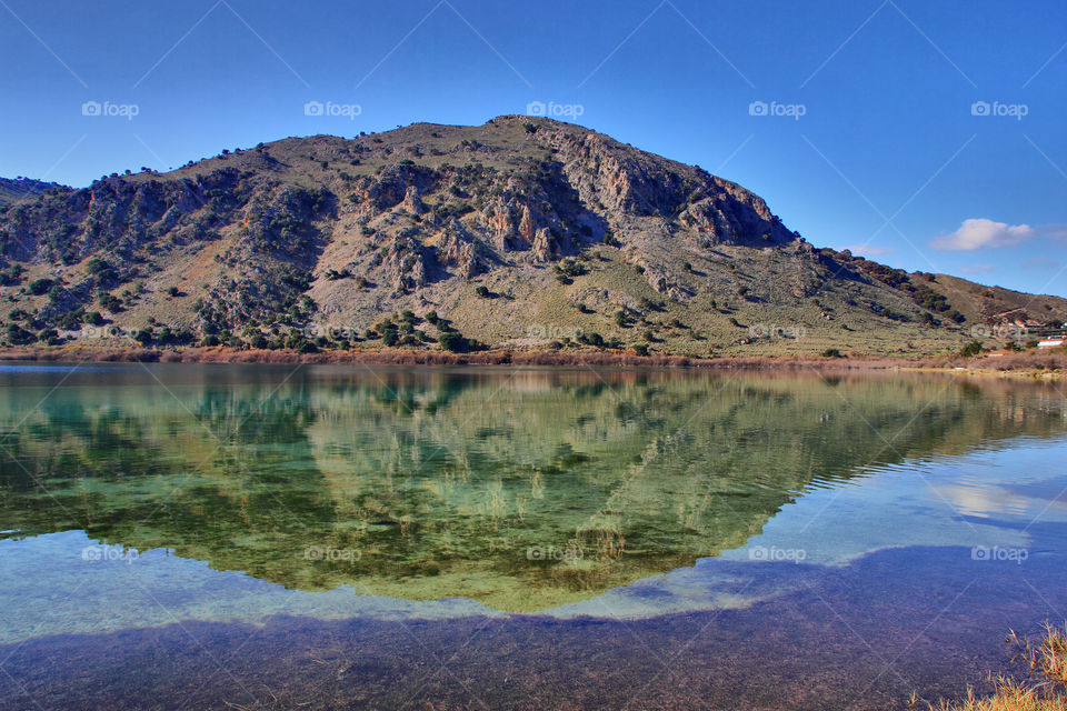 mountain water lake reflection by chaniaweb