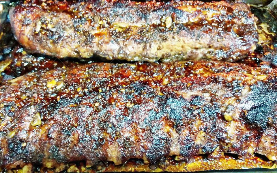 homemade oven cooked pork baby back ribs. set oven at 400 degrees cook on one side for 20 to 25 minutes turn over for another 20 to 25 minutes then turn heat down to 325 for 45 minutes take out let rest then it's time to eat.