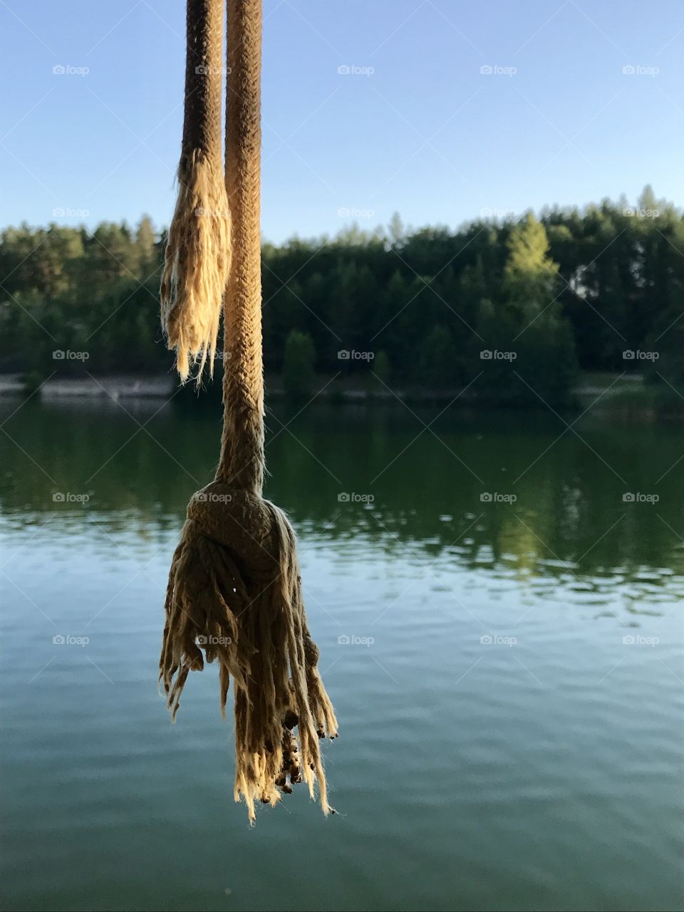 Swinging rope over lake