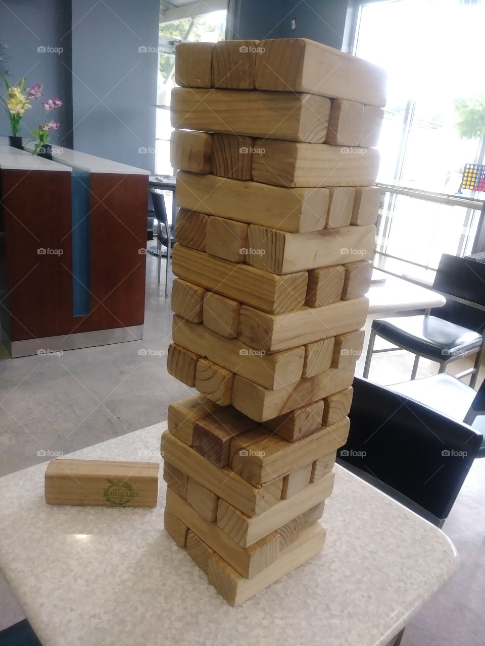 A game of Jenga. Wood game blocks stacked.