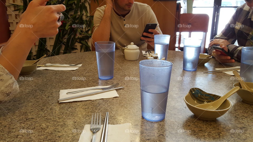 on phones at lunch