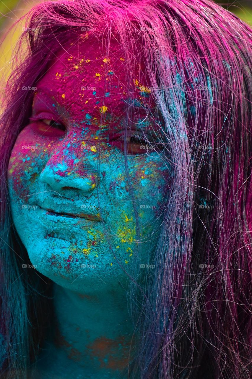 Indian girl celebrating holi festival