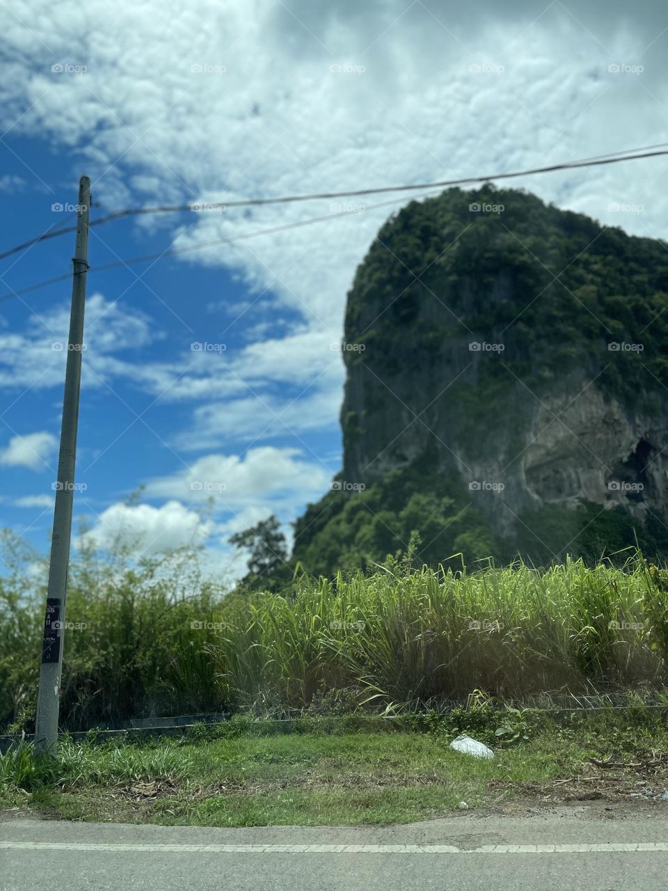 Hill view from below with beautiful sky and clouds as background 