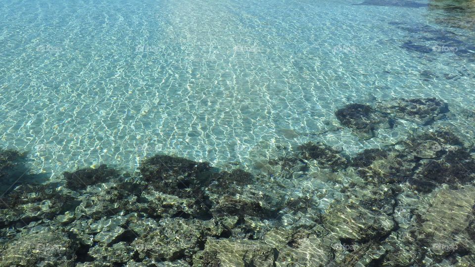 Clear water with rocks