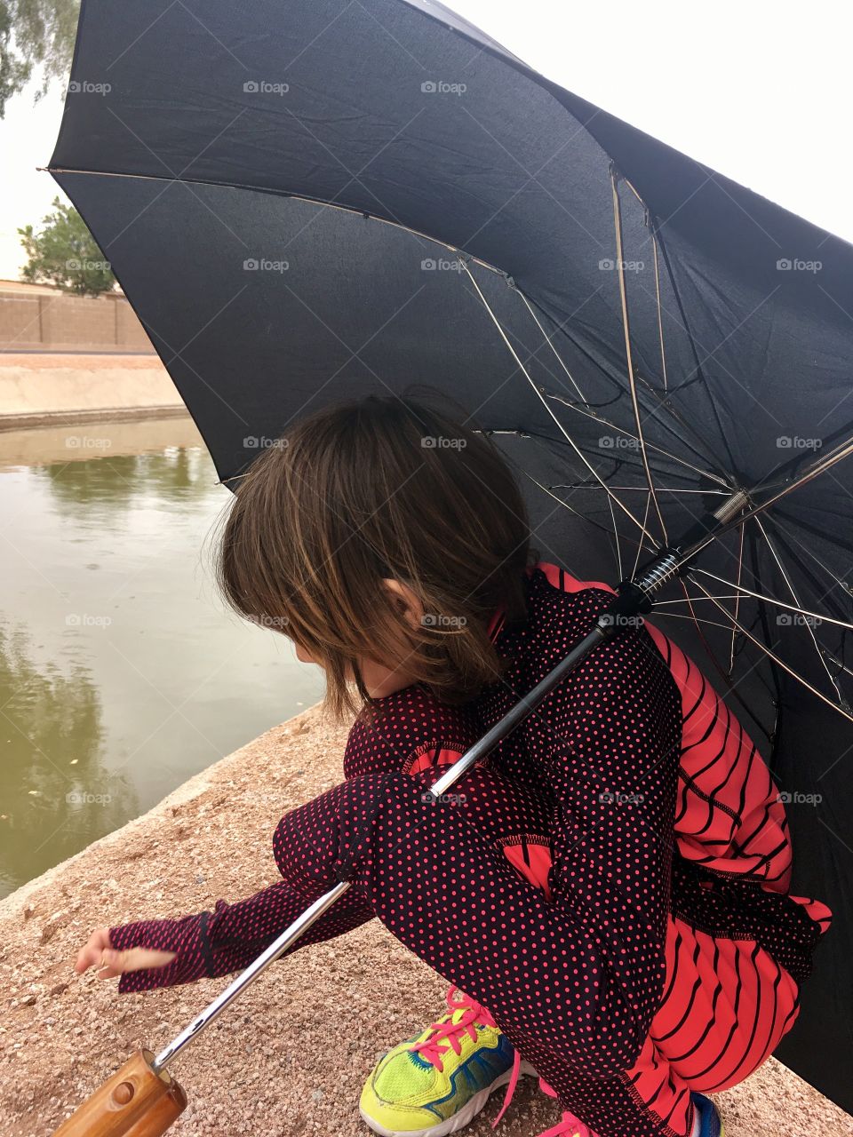 Umbrella and canal 